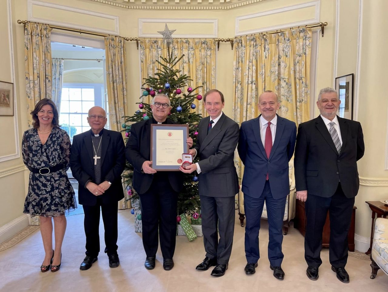 Mgr Charles Azzopardi Receives Governor’s Award For Merit