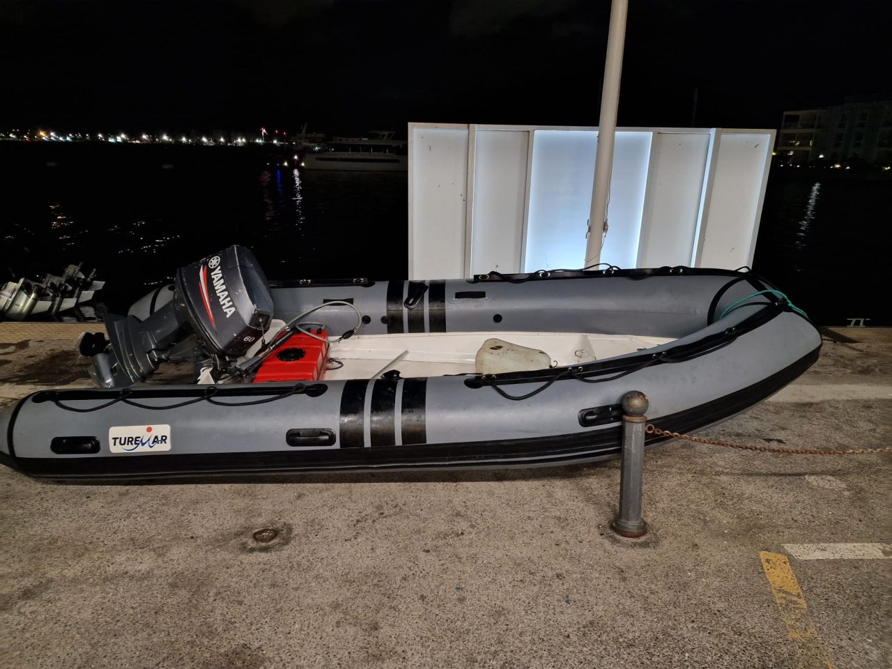 HM Customs Recovers Rigid-Hulled Inflatable Boat at Western Beach 