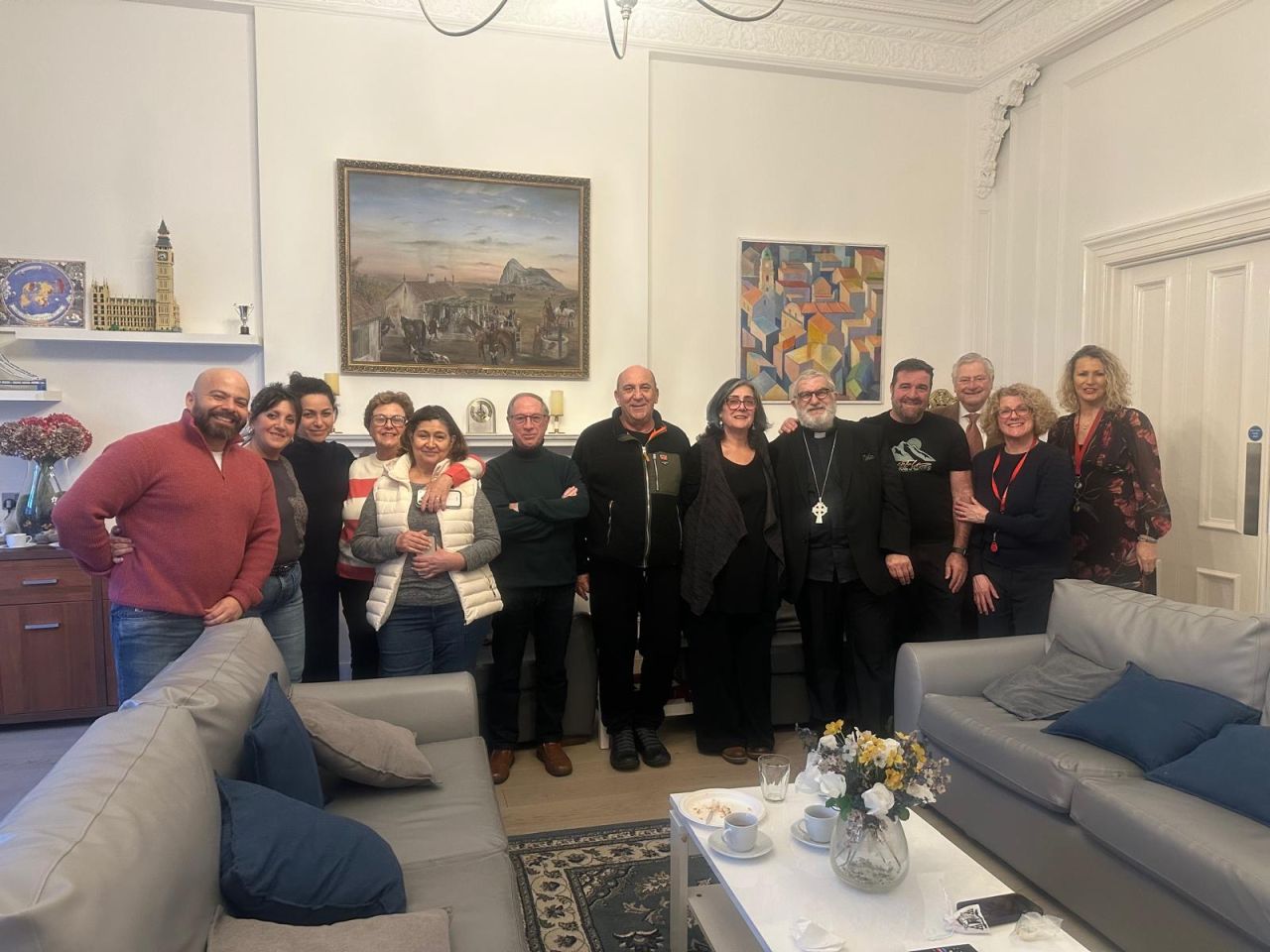 Bishop Azzopardi Visits Calpe House for Tea and Cake with Patients and Staff