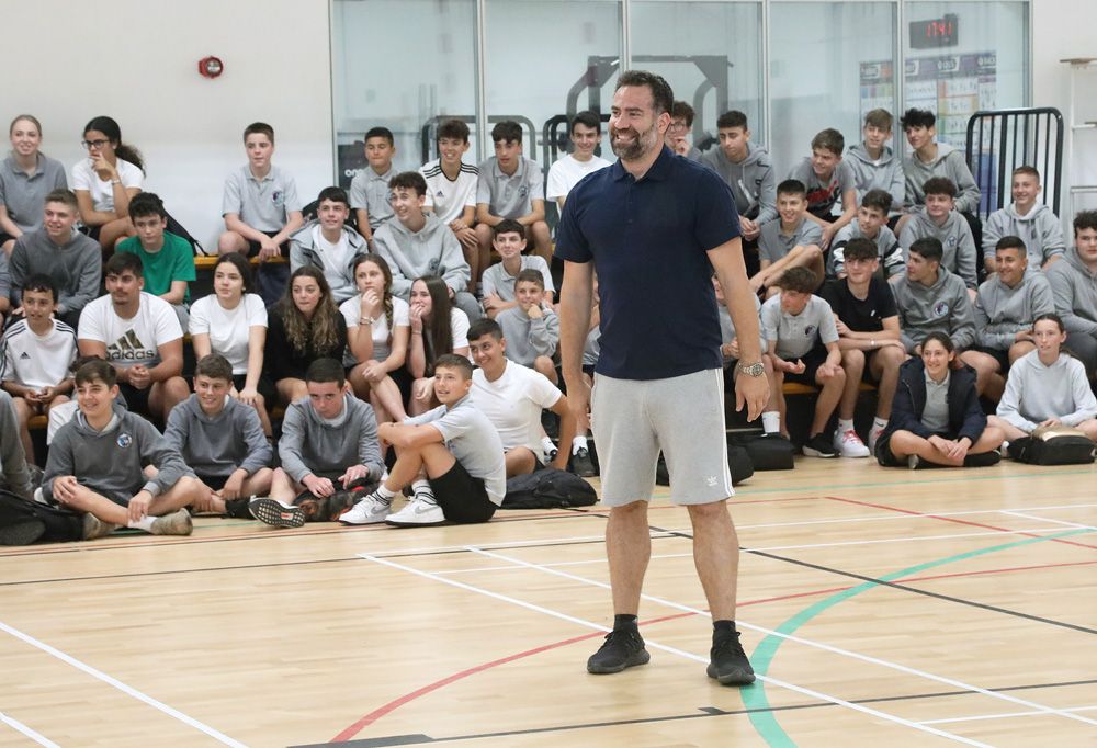 Basketball Legend Carlos Cabezas Visits Westside and Bayside Schools